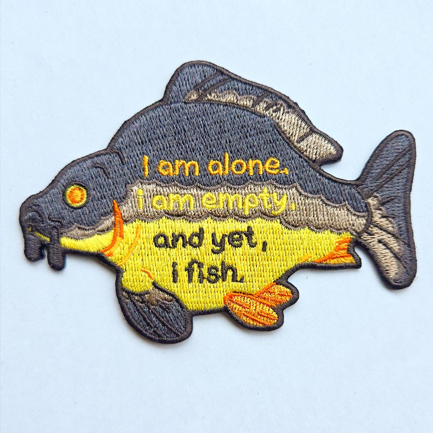 . and yet, I fish. iron-on patch